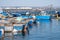 Colourful boats in the harbour at Taranto in Puglia, Southern Italy.