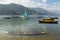 Colourful boats scattered on the Phewa Tal Lake in Pokhara, Nepal