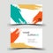Colourful business card design on the gray background.