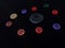 Colourful buttons on black background