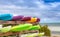 Colourful Canoes on a tropical beach