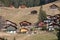 Colourful chalet houses in the Lauterbrunnen Valley, Switzerland, high up above the village of Wengen in the Swiss Alps.