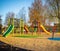 Colourful children\\\'s playground in park, created using generative ai technology