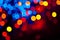 Colourful circles bokeh festive glitter dark background