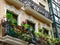Colourful classical facade with balconies and green plants downtown Bilbao, Basque country, Spain
