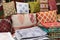 Colourful cushions on display for sale in a traditional Turkish Bazaar.