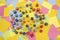 colourful dices on a table with multicolored paper sticky notes