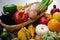 Colourful and different vegetables and fruits in a basket