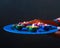 Colourful diyas placed on a blue plate to celebrate festival of lights