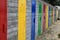 Colourful doors of storage cabins on the beach of St Ives