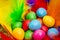 colourful Easter chocolate eggs feather