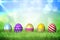 Colourful easter eggs on the grass