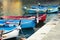 Colourful fishing boats in small marina of Vernazza, one of the five centuries-old villages of Cinque Terre, located on rugged