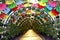 the colourful floral and umbrella arch at the Corniche