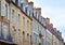 Colourful French Brittany typical facades. Stone builts and slate roofs