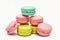 Colourful french macaroons or macaron on white, generative AI
