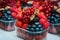 Colourful fruits and berries for sale in an open air market.