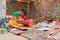 Colourful handicrafts being prepared for sale in Pingla village by Indian rural woman worker.