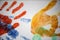Colourful Handprints of various sizes on canvas