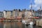 The colourful harbour of honfleur, france in summer