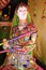 Colourful homemade statue of a women playing Dandiya.