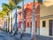 Colourful houses, palm on street Puerto de la Cruz town Tenerife Canary Islands