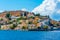 Colourful houses at waterfront of Greek island Symi