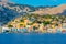 Colourful houses at waterfront of Greek island Symi