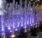 Colourful illuminated light fountain at night