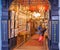 Colourful interior of Banks gallery Antique shop in Eastgate Street, Chester, Cheshire, UK