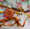 A colourful and intricately designed threads called Rakhi