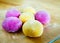 Colourful Japanese Mochi in a transparent plate.