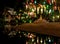 Colourful lanterns above Buddha statue.