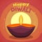 Colourful lit lamp for Happy Diwali celebration.