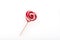 Colourful lollipop in the shape of a heart isolated on white background, a festive treat, a gift favorite, original declaration of