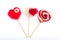 Colourful lollipop in the shape of a heart isolated on white background, a festive treat, a gift favorite, original declaration of