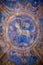 Colourful medieval painting on the ceiling of the main nave in Braunschweig Cathedral, with the peaceful sheep of Jesus in the