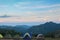 Colourful mountain tent in the evening in a beautiful nature.