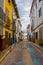 colourful narrow street in xativa town near valencia, which is famous for ist castle...IMAGE