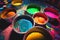 Colourful open spilling paint pots