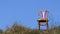 Colourful painted chair on top of dune