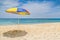 Colourful parasol umbrella on tropical island beach