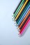 Colourful pencil colours with a white background or School supplies or Drawing supplies or Stationary or Back to school