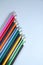 Colourful pencil colours with a white background or School supplies or Drawing supplies or Stationary or Back to school