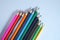 Colourful pencil colours with a white background or School supplies or Drawing supplies or Stationary or Back to school