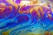 Colourful psychedelic soap bubble refractions pattern macro.