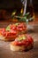 Colourful red tomato bruschetta