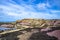 The colourful remains of the former copper mine Parys Mountain near Amlwch on the Isle of Anglesey, Wales, UK