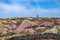 The colourful remains of the former copper mine Parys Mountain near Amlwch on the Isle of Anglesey, Wales, UK