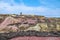 The colourful remains of the former copper mine Parys Mountain near Amlwch on the Isle of Anglesey, Wales, UK